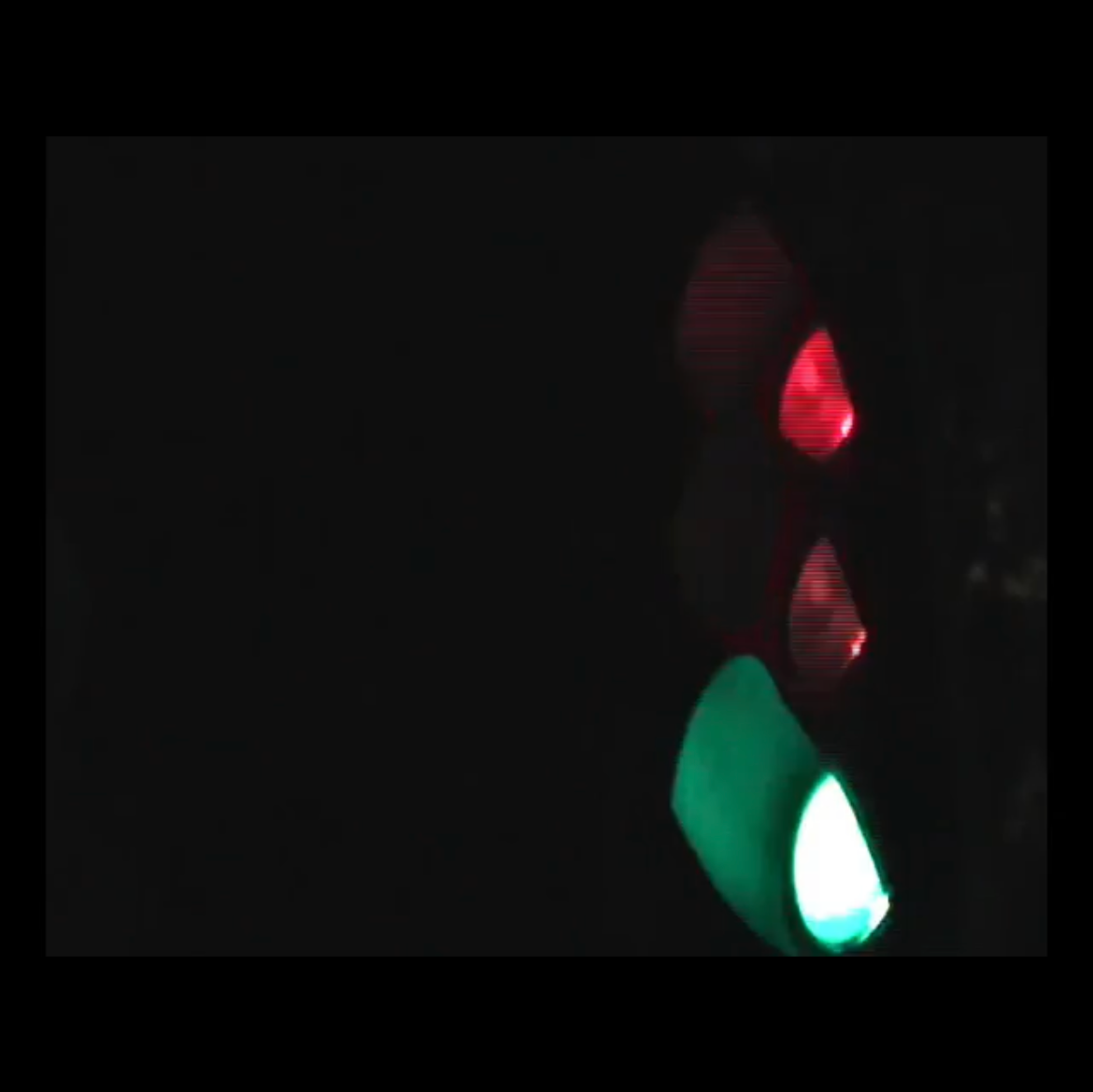 Video still from MP4 video file showing traffic lights.