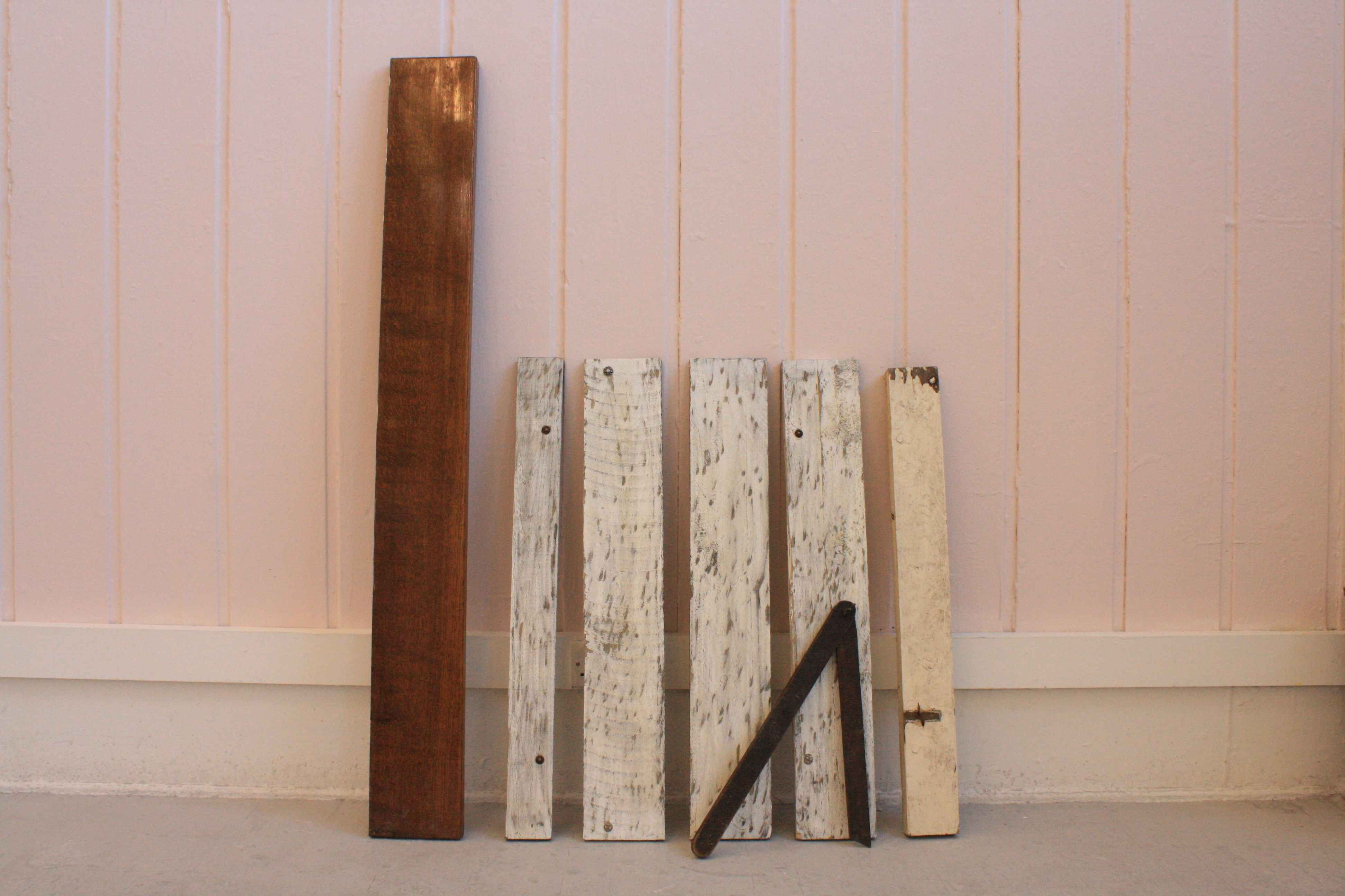 wooden beams resting on a wall 