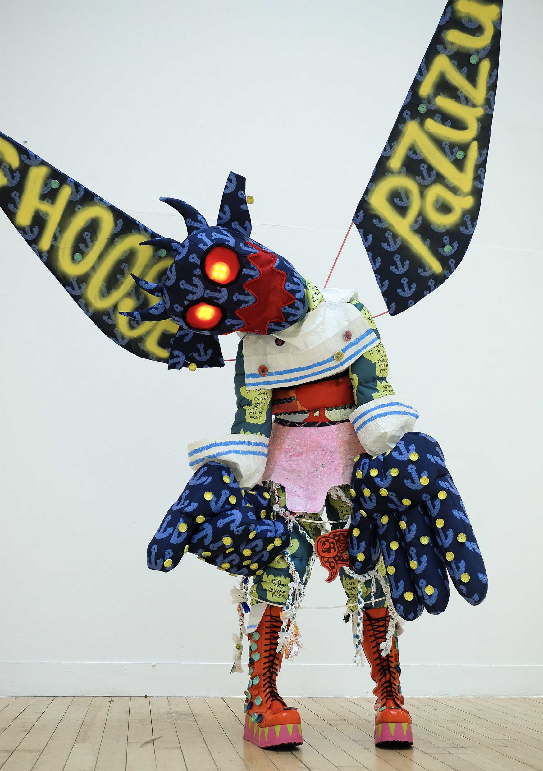 Model wearing Pazuzu costume in the sculpture court of ECA.