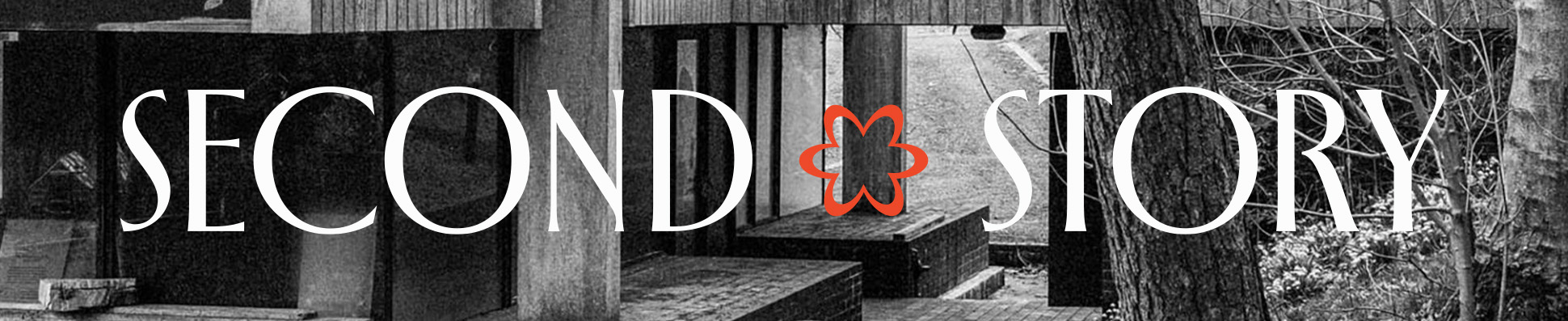 Black and white banner for ‘Second Story’ with large white serif lettering over a photograph of a modern building and trees. A small red flower symbol sits between the words ‘Second’ and ‘Story’.