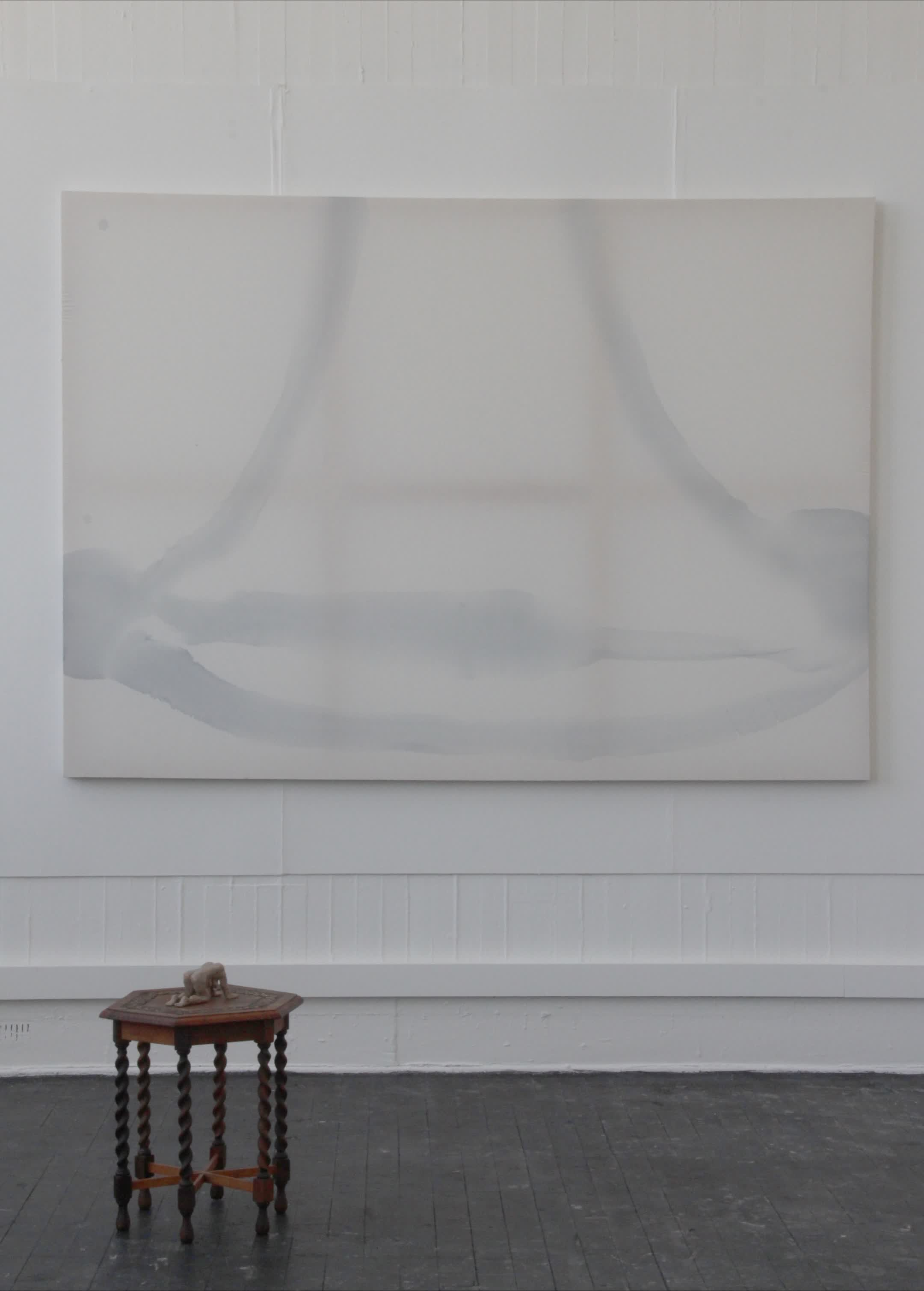 'Belly' (2026) ink on canvas, installed alongside 'All fours' (2026) glazed stoneware on found furniture