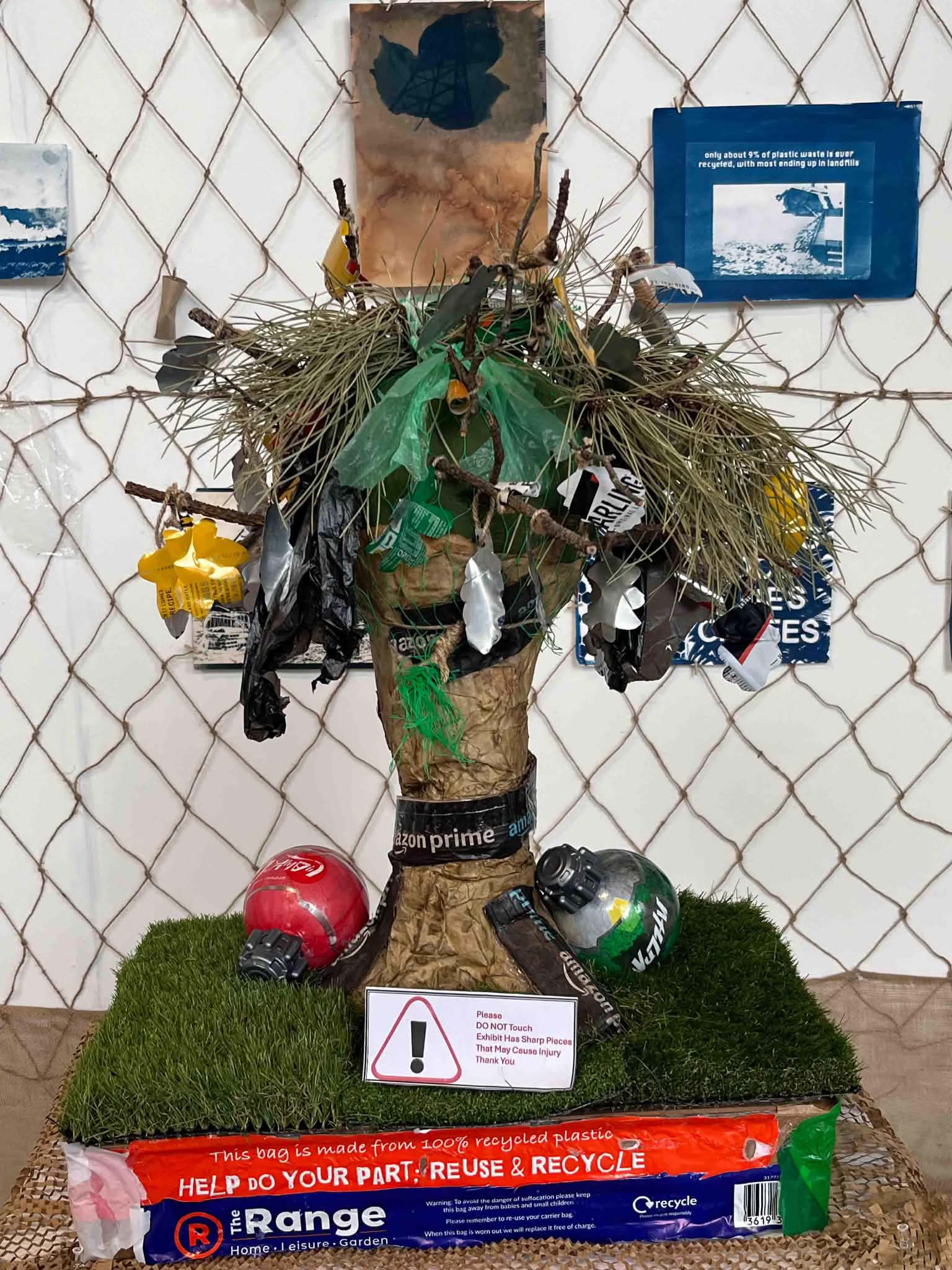 "The Repurposed Tree" made from a mix of nature and recycled objects.  